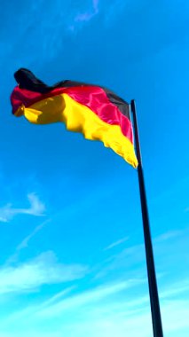 Almanya bayrağı. Almanya 'nın bayrağını dalgalandırın. Almanya 'nın bayrak sembolleri.