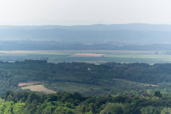 Agricultural land Ivansko polje near Brod, air haze