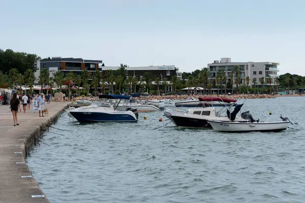 stock image Anchored motor boats near coast in Adriatic sea during overcast day