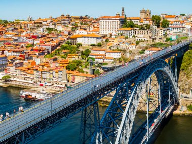 Stunning view of Dom Luis I bridge over the Douro river with the city of Porto in background, Portugal