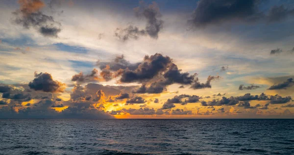 stock image Sunset sea landscape. Colorful beach sunrise with calm waves. Nature sea sky. Nature landscape view of beautiful tropical beach. Sunrise with clouds of different colors against the blue sky and sea