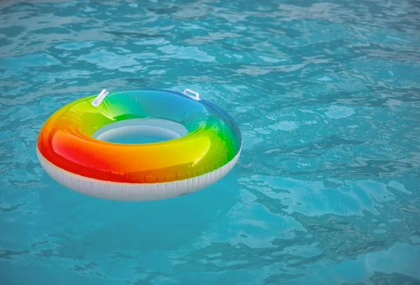Life save on water. Safety rubber circle, swimming pool. Help for drowning person