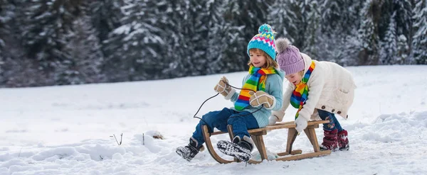 Boy Girl Sledding Snowy Forest Outdoor Winter Kids Fun Christmas — Stockfoto