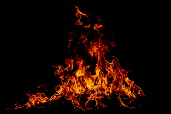 stock image Fire flame. Burn lights on a black background