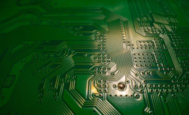 Electronic circuit board closeup. Electronic motherboard card. Circuitry and close-up on electronics. Background of electronics on board electrical circuits, technology texture