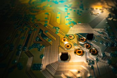 Electronic circuit board closeup. Electronic motherboard card. Circuitry and close-up on electronics. Background of electronics on board electrical circuits, technology texture