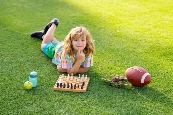 Concentrated Kid Developing Chess Strategy Playing Board Game Backyard Laying — Stock Photo, Image