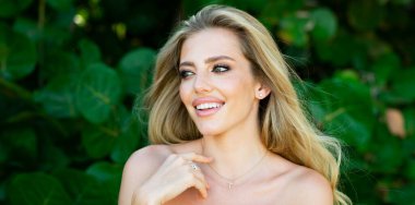 Woman beauty face. Spring banner website header. Summer model. Close up portrait of beautiful woman. Beautiful young girl in summer park outdoor. Pretty girl model on summer background