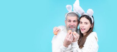 Easter banner, mockup copy space, poster flyer header for website template. Easter family with Easter eggs. Holidays. Family celebrate Easter