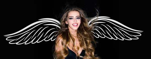 Angel woman with wings. Valentines day banner for website header design. Studio fashion shot. Beautiful cheerful and enjoying woman. Blonde woman with curly beautiful hair smiling on black background