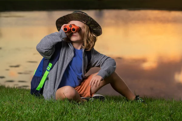 Young Boy Looking Binoculars Boy Traveler Backpack Summer Day Portrait — Foto de Stock