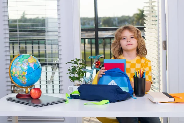 Portrait Cute Child School Boy Sitting Table Home Puts School — Foto Stock