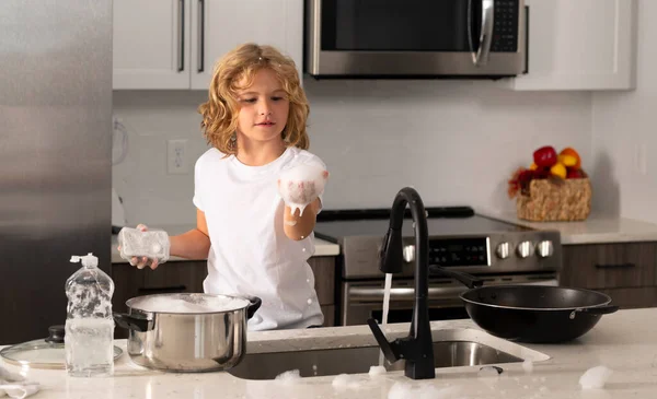 Child Boy Washing Dishes Kitchen Interior Dishwashing Liquid Sponge Kitchen — Stockfoto