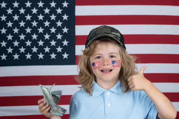 American dreams. Happy rich kid boy with money dollars cash. Kid celebration independence day 4th of july. United States of America concept