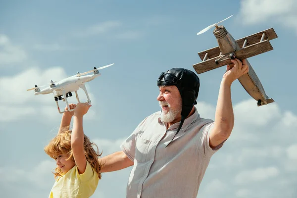 Grandfather Grandson Plane Quadcopter Drone Blue Sky Clouds Background Elderly — kuvapankkivalokuva