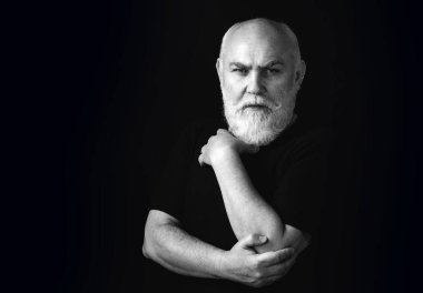 Son sınıf, Altın Çağ. Çekici, ciddi, orta yaşlı adam.