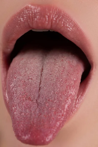 Tongue out. Open woman mouth. Sexy tongue