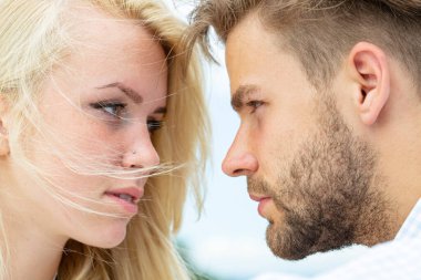Sensual passionate couple enjoying tenderness and intimacy. Young sexy couple. Romantic lovers. Studio portrait of young couple. Beautiful sensual woman and sexy man