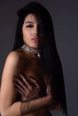 Sexy attractive woman posing with slim sexy body. Beautiful sexy model portrait. Beauty woman face. Attractive sensual girl