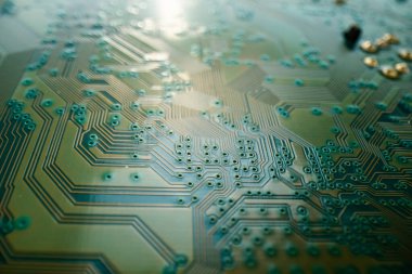 Electronic circuit board closeup. Electronic motherboard card. Circuitry and close-up on electronics. Background of electronics on board electrical circuits, technology texture