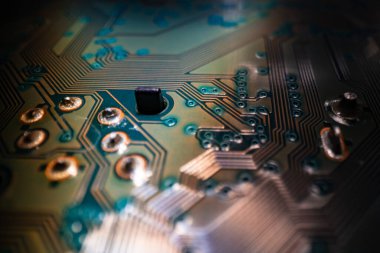 Electronic circuit board closeup. Electronic motherboard card. Circuitry and close-up on electronics. Background of electronics on board electrical circuits, technology texture