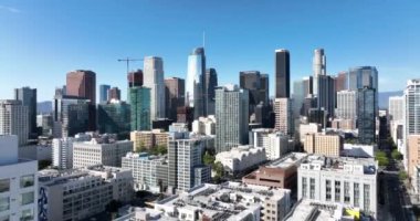 Los Angeles. Fly on LA city center by drone, top aerial view. American megalopolis, business center. Los Angeles, CA, USA, May 10, 2022