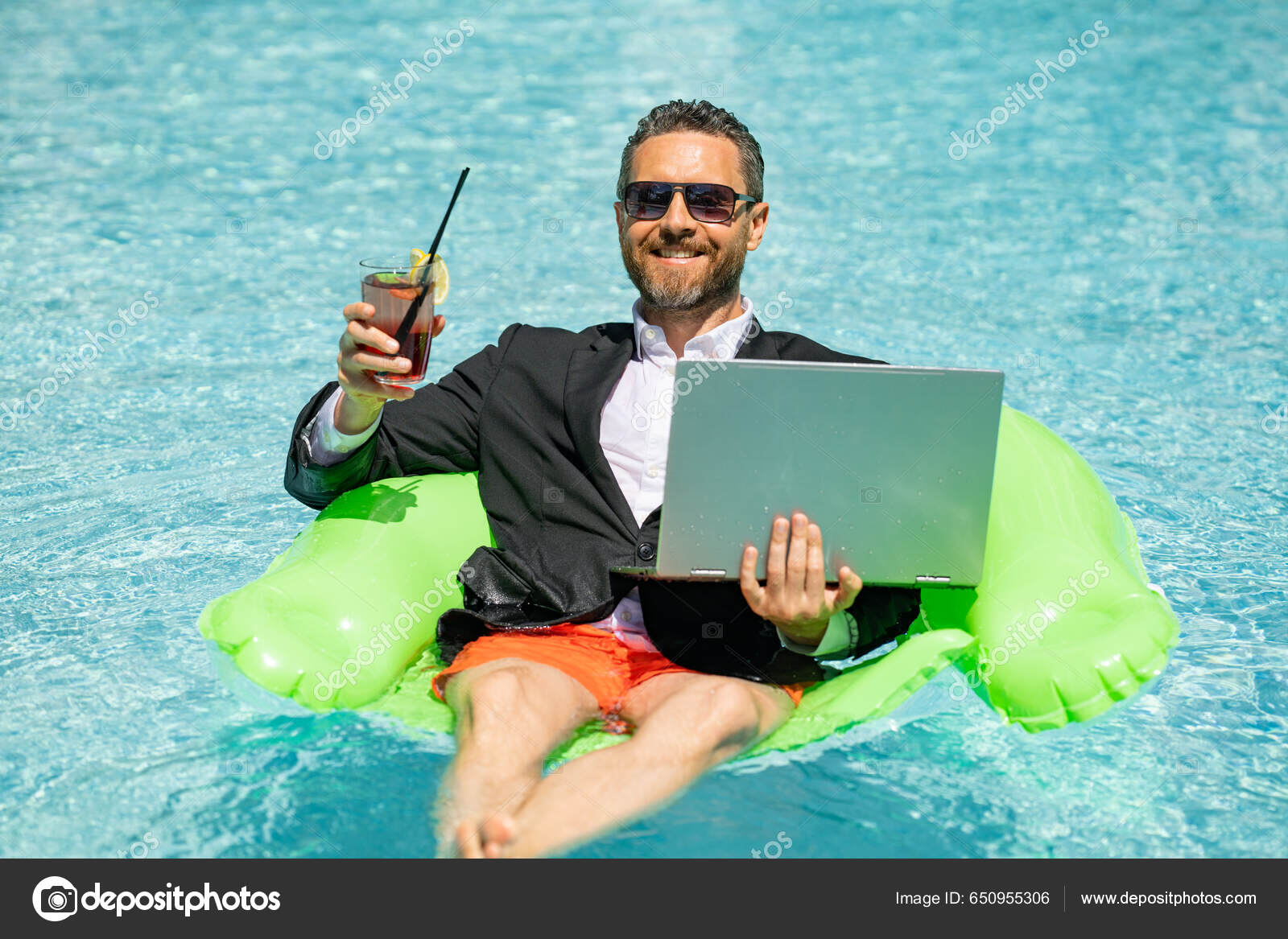 Premium Photo  Crazy summer business drink summer cocktail and using  laptop in suit in water pool fun business life