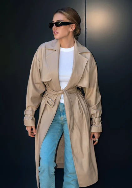 Beautiful slim woman with perfect figure. Fashion Model. Fashion woman in wearing fashion trendy clothes. Beige coat
