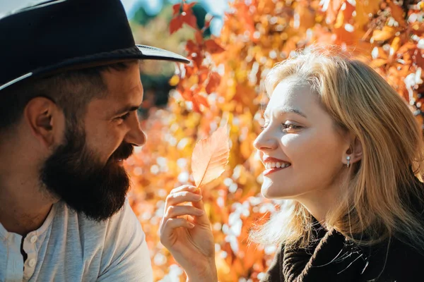 Parting with sweetheart. Bearded hipster man and tender blonde woman in love. Couple in love happy close up nature background defocused. Love in air. Lovely couple smiling each other. True feelings.
