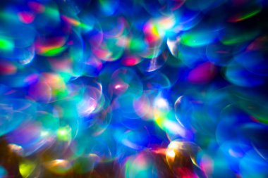 Renkli parlak ışıklar arka planda. Odaklanmış bokeh. Işık dokusu. Bulanık ışık arka planı. Soyut bokeh arkaplanı. Sanat tasarımı. Parlak parlak bokeh arkaplanı