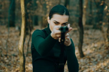 Hunting target. Target shot. female hunter in forest. woman with weapon. girl with rifle. chase hunting. Gun shop. successful hunt. hunting sport. military fashion. achievements of goals.