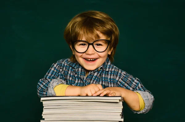 stock image School and education concept. Classroom. Teachers day. Happy smiling pupils drawing at the desk. Back to school and happy time.