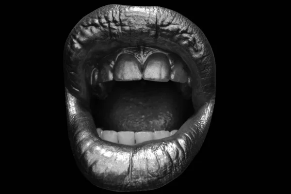 Golden woman lips. Womans gold lip. Female mouth close up with golden lipstick. Screaming mouth isolated, shouting mouth close up