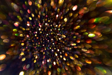 Bokeh arka planı aydınlatıyor. Parlak bokeh ışıkları. Şenlik arka planı. Bokeh odaklanmış ışıklarla soyut arkaplan. Kutlama arka planı için Bokeh 'in ışıldayan yıldızları