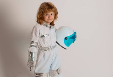 Little boy astronaut. Child boy playing astronaut with spaceman