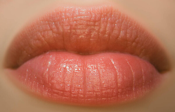 Natural lips. Sensual woman mouth, skin background