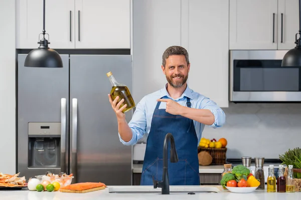 Portrait Happy Smiling Man Cook Apron Preparing Natural Meal Bottle — Stock Photo, Image
