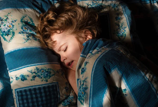 stock image Kids little boy sleeps in the bed on pillow