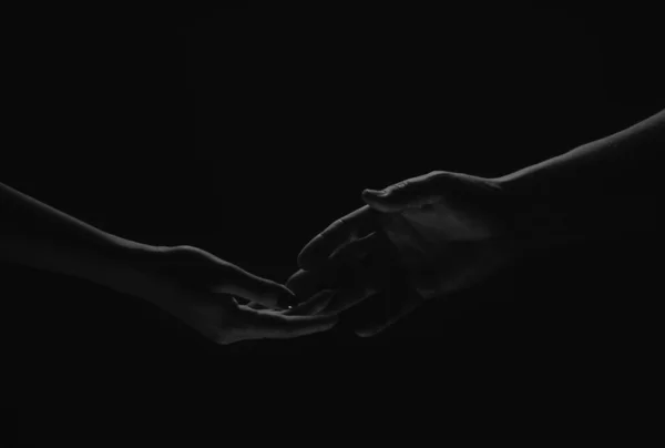 Two Hands Reaching Helping Hand Outstretched Salvation Isolated Black Background — Stock fotografie