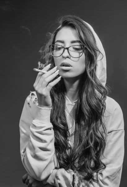 Smoking girl. Cigarette nicotine addiction. Women with smoke addiction. Sensual girl with cigarettes. Addiction and dependence