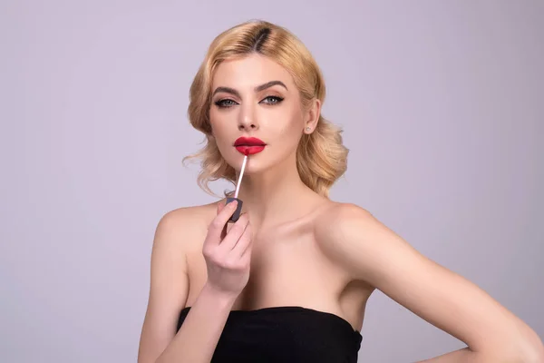 Beautiful Young Woman Applying Red Lipstick Lips Studio Color Background — Fotografia de Stock