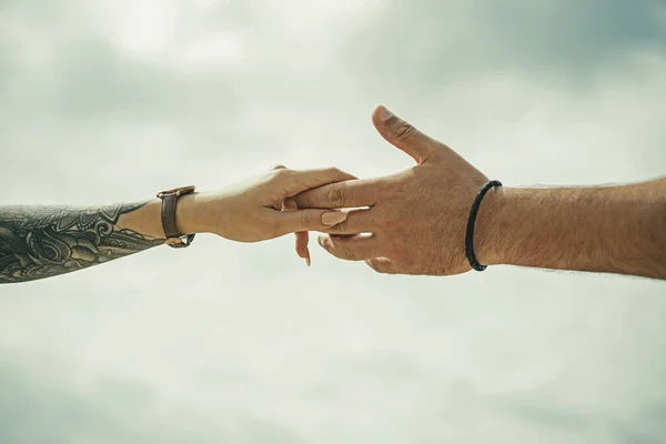 Couple Hands Tattoo Helping Hand Holding Hand Close Giving Help — Stock Photo, Image