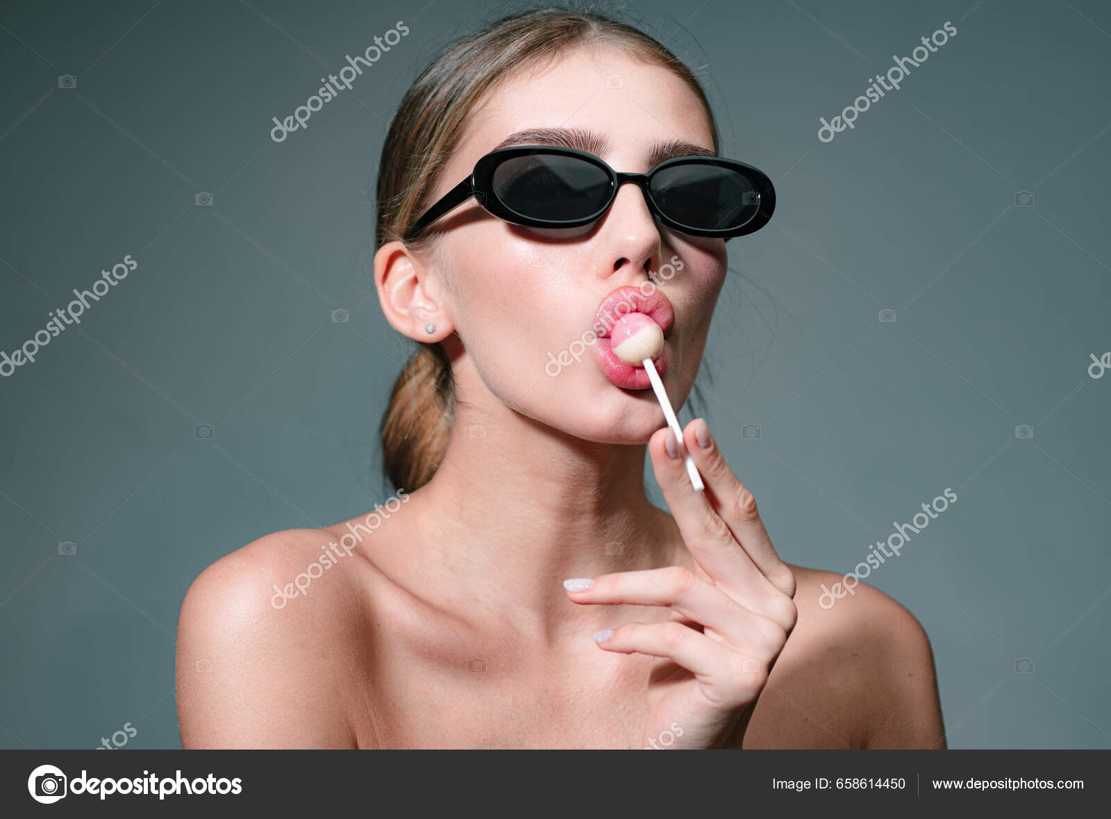 Sexy Woman Face Beautiful Amazing Sexy Woman Sunglasses Lollipop Studio  Stock Photo by ©Tverdohlib.com 658614450