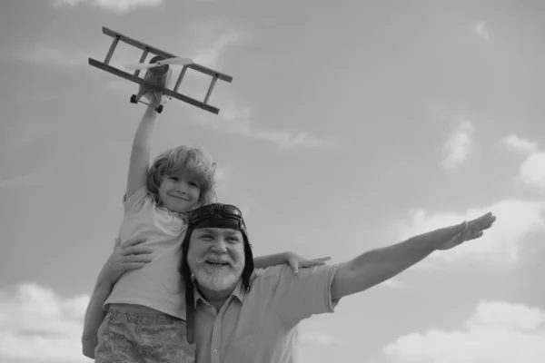 Grandfather Grandson Having Fun Plane Outdoor Sky Background Copy Space — Stock fotografie