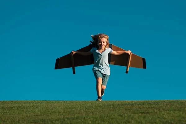 Kid Playing Toy Plane Wings Summer Park Kid Dreams Future — Stock Photo, Image