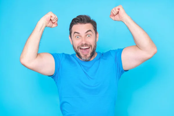 Cheerful Excited Man Celebrating Success Studio Blue Isolated Background Excited — Stock Photo, Image
