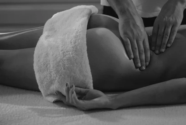 stock image Professional massage at home. Ideal womans butt anti-cellulite and skin care. Massage and body care. Massage Therapy for Health Purposes. Massage Oils and Scented Body Oil. Relax