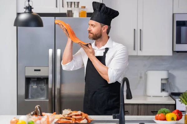 Handsome Senior Man Cook Apron Chef Hat Cooking Fish Salmon — Stock Photo, Image