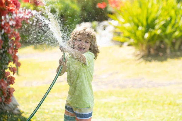 Little Gardener Child Helping Watering Flowers Garden Hose Summer Garden — Stock Photo, Image