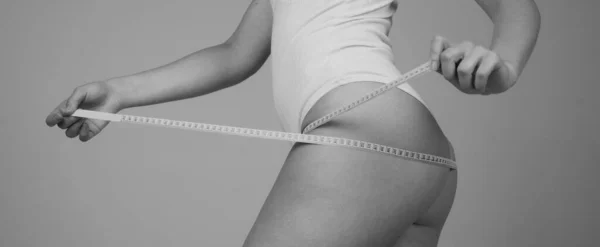 Slim Girl Holding Centimeter Buttocks Slim Young Woman Measuring Her — Fotografia de Stock